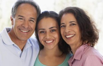 Couple with their teenage daughter