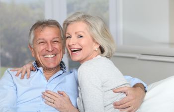 Older Couple With Implant Supported Dentures